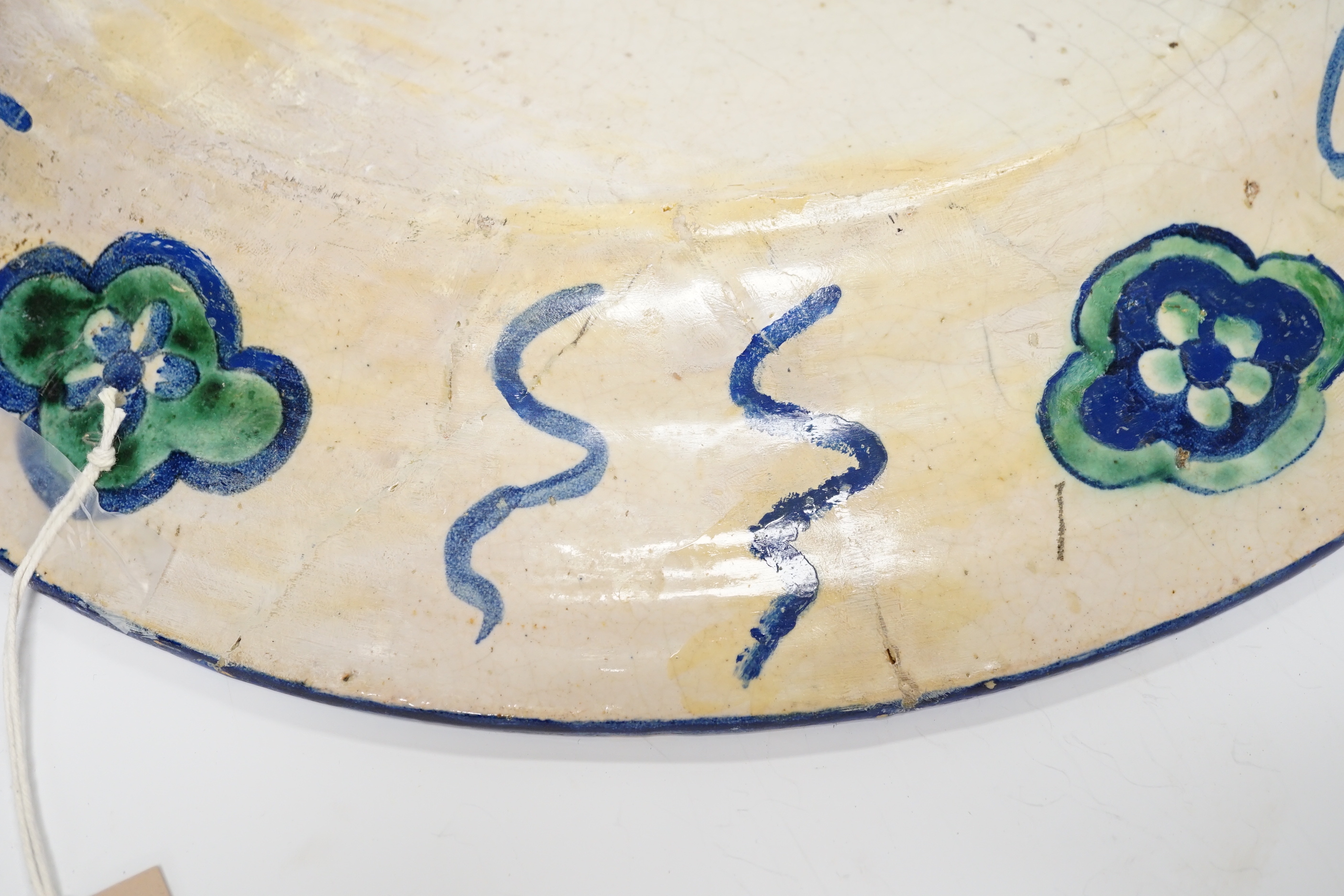 A late 19th century Italian charger in Iznik style, 45cm in diameter